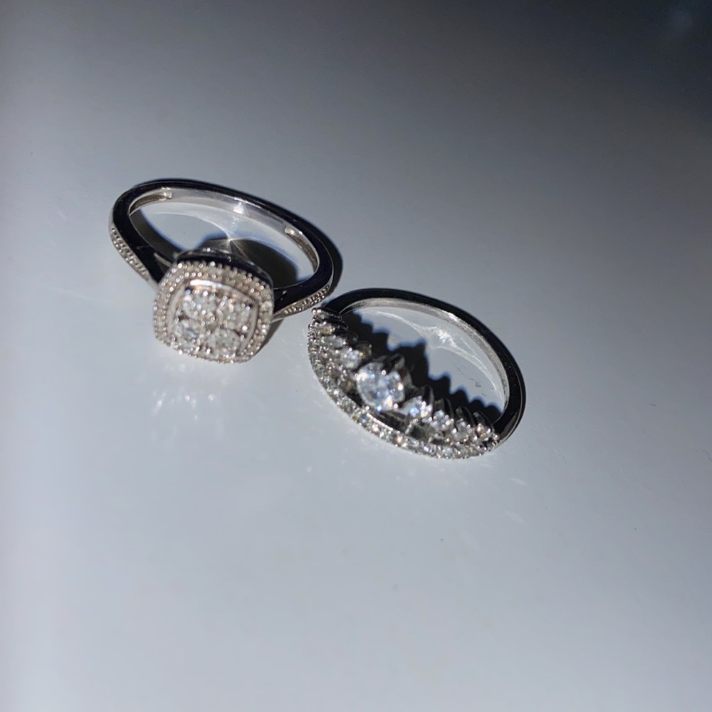 One pandora ring, one vivamacity ring. silver and shiny